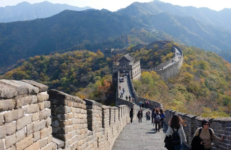 Tourists are climbing the Badaling Great Wall.