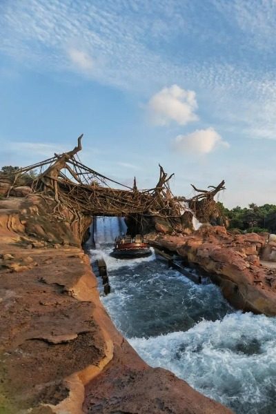 Visitors are having fun on the water rides in Adventure Isle at Shanghai Disneyland.