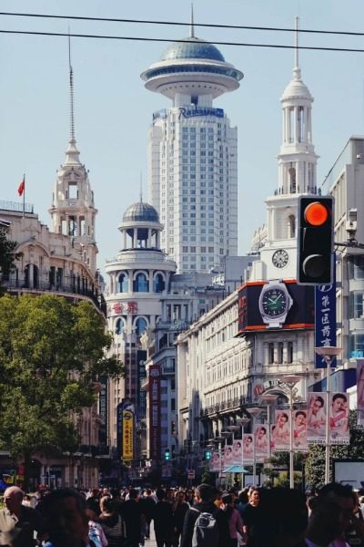 You can see a lot of classical high-rise buildings on Nanjing Road pedestrian street in Shanghai.