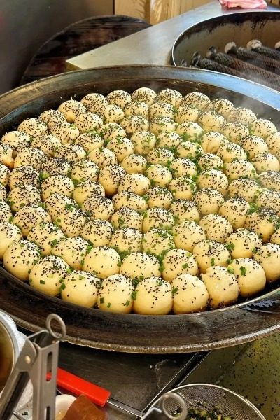 Authentic Shanghai Cuisine: Fried Buns (Shengjianbao).