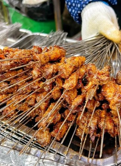 Grilled meat skewers are a favorite dish in Xi'an cuisine, celebrated for their savory taste and charred, delicious exterior.