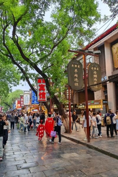 The Muslim Quarter (Hui Min Street) in Xi'an is a vibrant food street, famous for its diverse and delicious halal dishes.