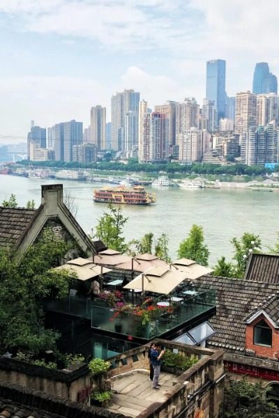 Next to Longmenhao Old Street in Chongqing is the river.