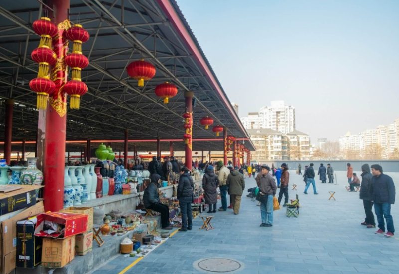 Many locals in Beijing are shopping for treasures at the Panjiayuan Flea Market.