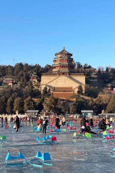 In winter, tourists ice skate at the Summer Palace ice rink