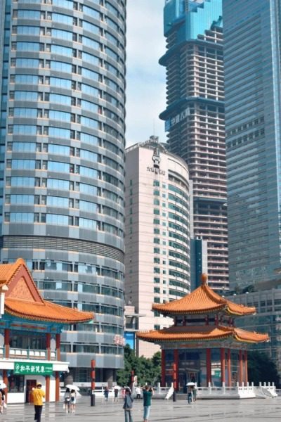 Surrounding Kuixing Tower in Chongqing are tall buildings and skyscrapers.