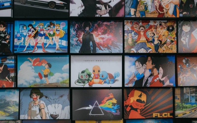 The wall is filled with photos of many internationally famous anime.