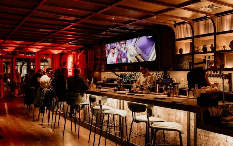 Tourists enjoy drinks in bars in Shanghai.