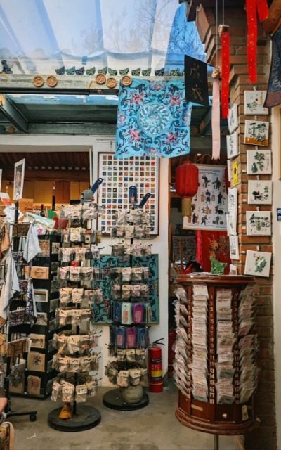 The small shop in a Beijing hutong is filled with traditional Chinese handicrafts.