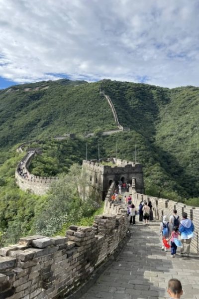 Tourists are heading back after finishing their climb of the Mutianyu Great Wall.