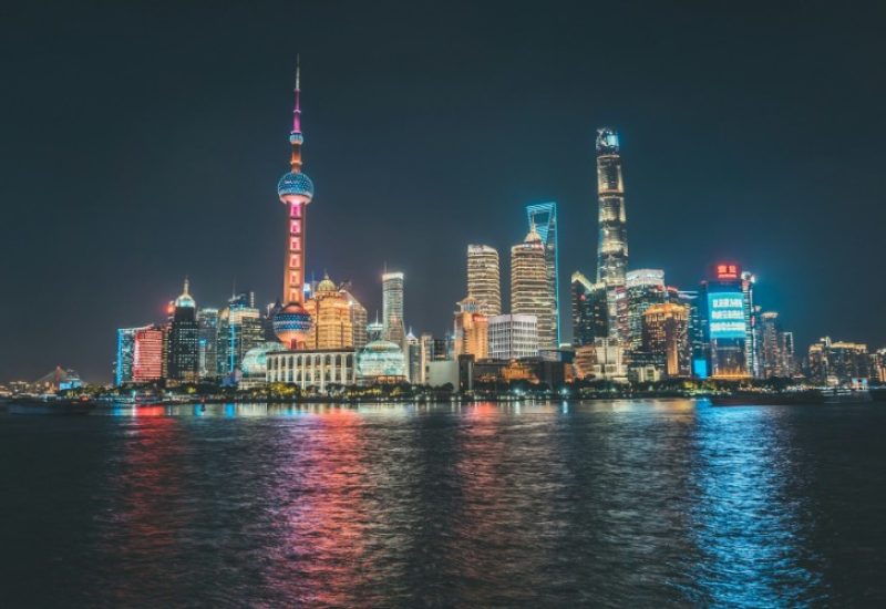 The lights along the Bund in Shanghai at night are colorful and stunning.