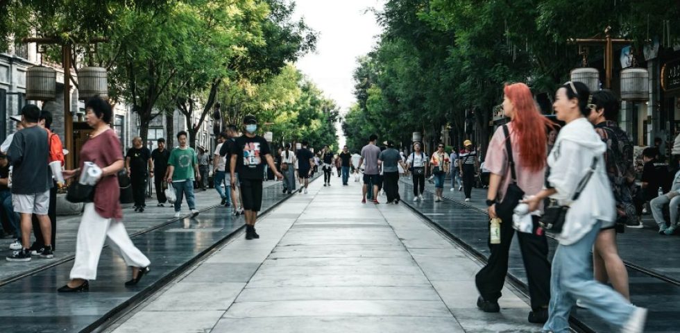 Tourists are shopping on Qianmen Street.