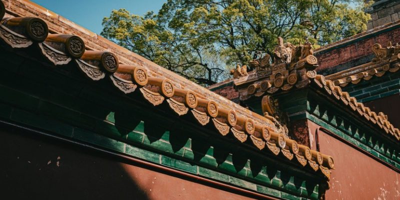 The traditional red walls within Beihai Park.